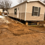Manufactured Home after being set on blocks